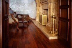 A room with well-waxed wooden floor